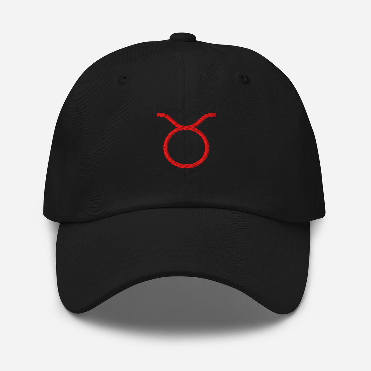 Black Taurus zodiac cap with red embroidered glyph, right side view